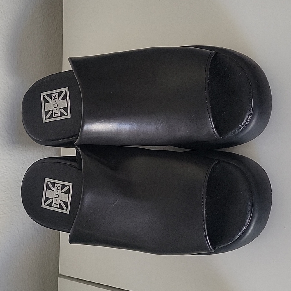 TUK black bubble platform sandals.